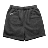 Gob Shorts in charcoal grey with CG embroidery on upper right leg, featuring elastic waistband and rolled hem design. Casual athletic style shorts with comfortable loose fit and classic silhouette.