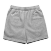 Gob Shorts in heather gray cotton featuring elastic waistband, relaxed fit, and CG embroidered logo on upper right leg. Limited edition casual wear with cuffed hem design.