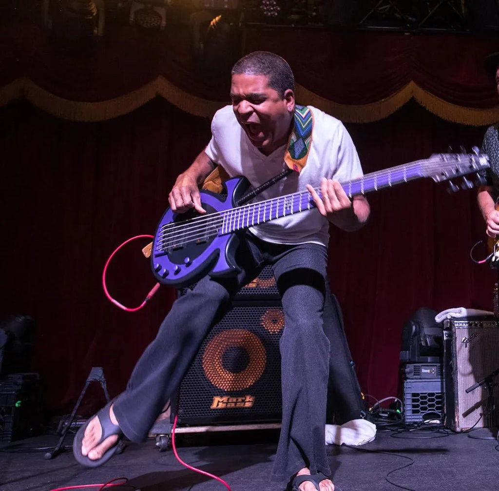 Oteil Burbridge playing his signature bass on stap