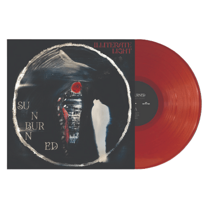 Vinyl record with dark abstract cover art featuring two ghostly figures inside a rough white circle and red text on top right