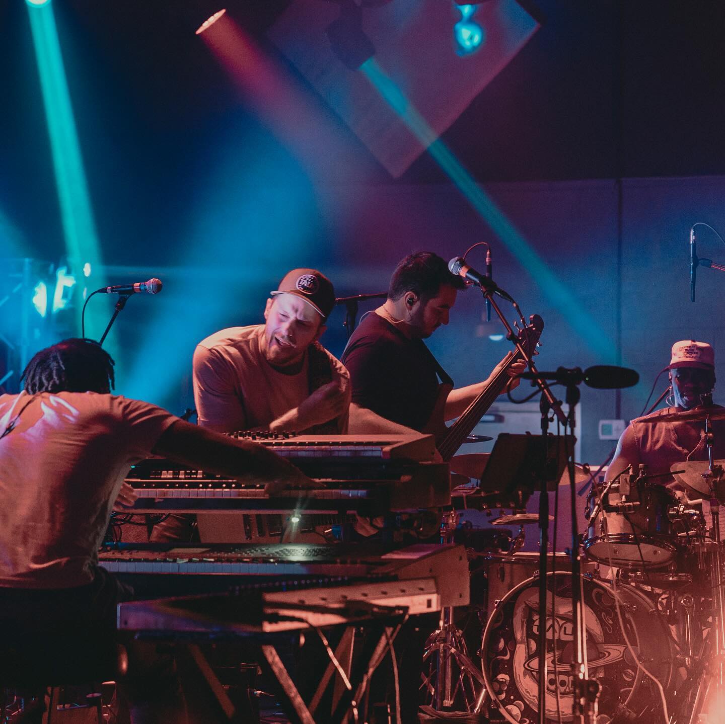 close up of the band performing on stage