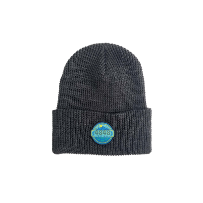 4848 Blue and yellow Circle Logo Patch on a gray knit beanie