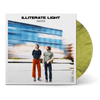 Vinyl record with green marbled color and cover showing two men standing in front of a blurred moving blue train