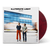 Vinyl record with translucent dark red color and cover showing two men standing on platform in front of a blurred blue train in motion