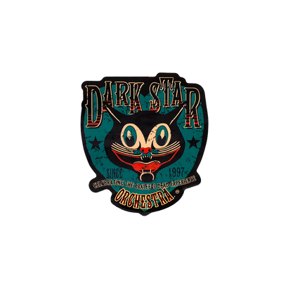 Dark Star Orchestra cat sticker featuring a whimsical black cat face with wide eyes and grinning mouth on teal background. Text reads 