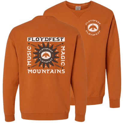 Orange crewneck sweatshirt with FloydFest SunBird design. Front features circular logo on left chest. Back displays large graphic with 