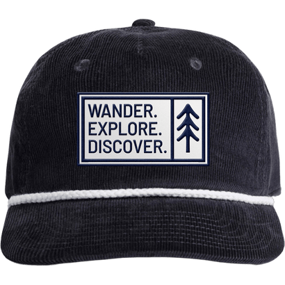 Navy mid-profile cord rope hat with Wander Explore Discover patch and white rope detail on front crown