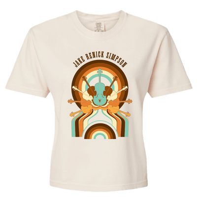 An off-white short-sleeve t-shirt featuring multiple fiddles in a circular retro design with the text 'JAKE RENICK SIMPSON' arched above it.