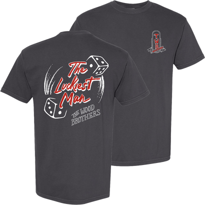 A dark charcoal gray t-shirt shown from both the front and back sign graphic on the left chest while the back has the luckiest man dice graphic.