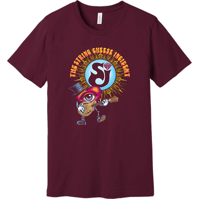 SCI Dancing Heart Tee featuring a whimsical animated character with a guitar, set against an oxblood background. The design shows The String Cheese Incident's logo with vibrant blue, orange, and purple colors in a playful, psychedelic style created by artist Paul Dempsey.