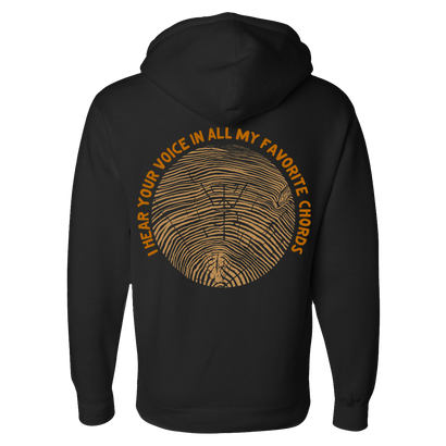 Back Graphic featuring With The Punches Wood Grain Carved Logo and the words I hear your voice in all my favorite chords. Black Hooded Sweatshirt