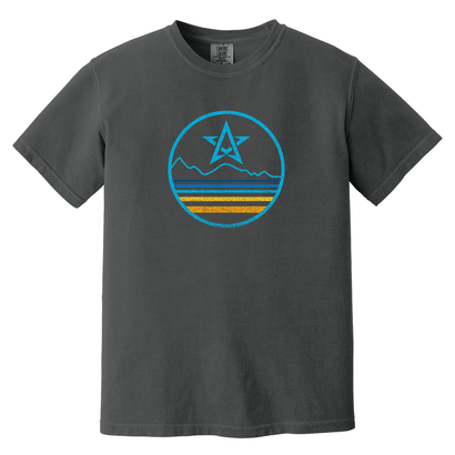Dark grey t-shirt with NVC Circle Logo featuring blue mountain design and orange stripes in circular emblem