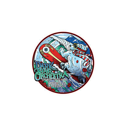 Colorful circular magnet featuring a vibrant winter scene with cartoon snowboarder, mountains, and waves. Text reads 'Dark Orchestra Winter Tour 2022' in stylized font. Ideal souvenir for music and winter sports enthusiasts.