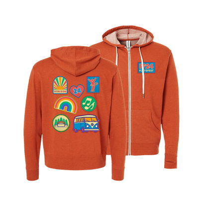 Orange zip-up hoodie with colorful patch icons on back, including rainbow, VW bus, and nature symbols. Front features '24 logo patch. Contrasting light-colored hood lining and drawstrings. Comfortable casual wear for outdoor enthusiasts and festival-goers.