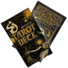Black tarot card deck box with gold celestial designs and 
