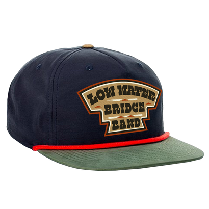 Navy and green snapback hat with red trim featuring 'Low Water Bridge Band' logo patch on front, flat brim design, and classic western-style structure