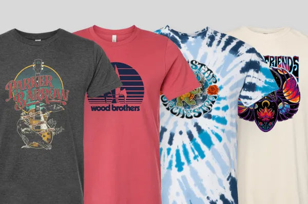 Four t-shirts from Parker Barrow, The Wood Brothers, Dark Star Orchestra and Oteil Burbridge & Friends on a gray background