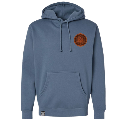 One Drop Design Studio Origins Hoodie in Storm Blue with Graphic Patch sewn on the left chest - front view