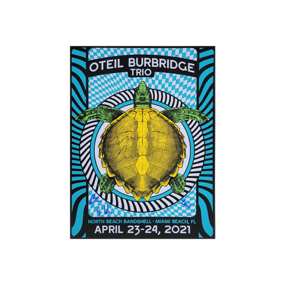 Psychedelic concert poster for Oteil Burbridge Trio featuring a vibrant yellow turtle on a blue and black geometric background. Event details for North Beach Bandshell, Miami Beach, April 23-24, 2021 shown at bottom.