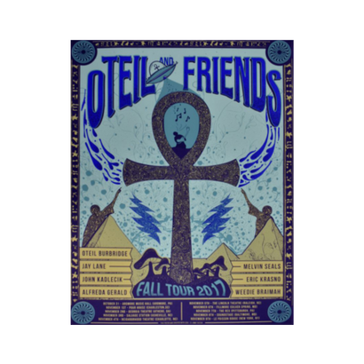 Vintage-style concert poster for Oteil & Friends Fall Tour 2017, featuring purple ankh symbol with blue wings, lightning bolts, and Egyptian pyramids. Band names and tour dates listed on blue background with ornate border design.