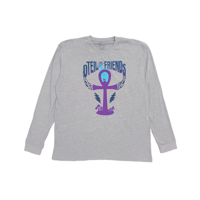 Gray long sleeve t-shirt featuring Oteil & Friends logo with purple ankh symbol, blue text, and lightning bolt design. Comfortable casual wear for music fans and concert-goers.