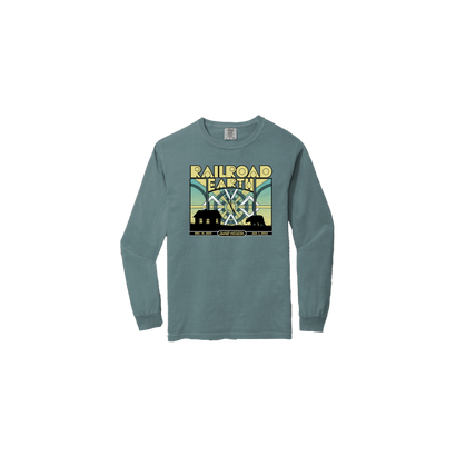 NYE 2021 Fillmore Long Sleeve featuring Art Deco lettering and Railroad Earth design in blue spruce color. Comfort Colors cotton shirt displays mountain silhouette with radiating sunburst pattern in retro concert poster style.