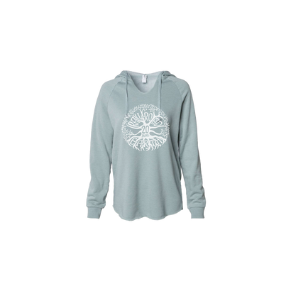 20th Anniversary Sage Lightweight Women's Hoodie featuring a white circular tree design on a soft sage-colored pullover. The stylized tree graphic spreads in a circular pattern against the light green fabric, with long sleeves and hood detail.