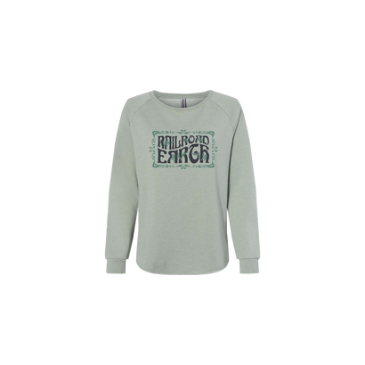 RRE Women's Fern Crewneck sweatshirt in sage green featuring vintage-style Railroad Earth logo with decorative border. Classic fit raglan sleeve design with wave wash finish creating a soft, lived-in appearance.