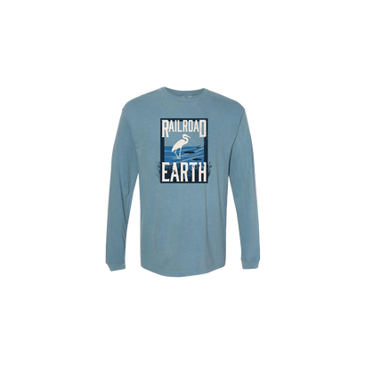 Railroad Earth Heron Long Sleeve shirt in light blue featuring a stylized white heron graphic against a gradient blue background within a rectangular frame. The brand name Railroad Earth appears in white text above and below the heron design.