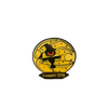 2018 Suwannee Hulaween Pin featuring a black dancing scarecrow silhouette with glowing orange smile against a golden circular moon background, decorated with stars and swirls, with Suwannee 2018 text banner below