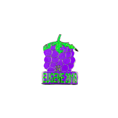 2018 Blackberry Pin featuring a bright purple cluster of berries with green leaves and stem, with Eugene 2018 text at the bottom, commemorating The String Cheese Incident tour stop in metallic enamel finish