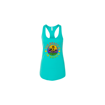 2022 Jamaica Incident Women's Tank in vibrant aqua featuring a colorful circular design with a mushroom island graphic and 'The Beach Is In Reach' text, displayed on a racerback style tank top with yellow and orange tropical beach motif