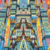 Limited edition SCI New Years Eve 2023 concert poster featuring vibrant psychedelic art design with intricate blue, yellow, and red patterns forming a symmetrical temple-like structure, highlighted by detailed geometric shapes and ornate decorative elements