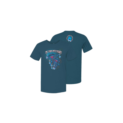 SCI 30th Anniversary Short Sleeve Tee featuring vibrant purple and blue artistic design on deep teal cotton fabric, with band logo on front and small circular emblem on upper back, displaying classic Bella Canvas comfort fit style