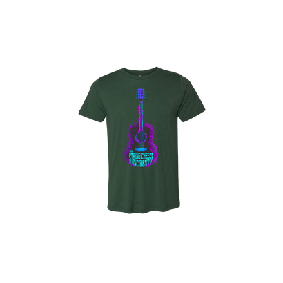 Growing Guitar Tee featuring a vibrant purple and blue acoustic guitar design with psychedelic elements printed on a forest green tri-blend t-shirt. The artistic graphic shows a guitar silhouette with intricate organic patterns and the String Cheese Incident band name incorporated within.